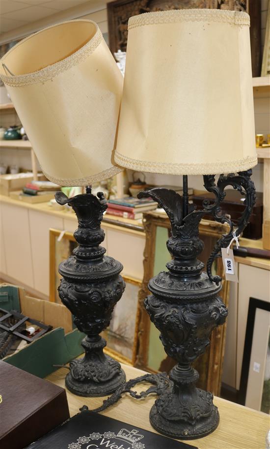 A pair of Edwardian painted spelter ewer table lamps height 60cm